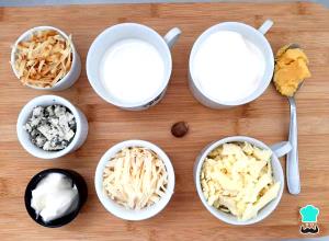 Quantas calorias em 1/2 colher de sopa (3,1 g) Molho Cremoso 4 Queijos?
