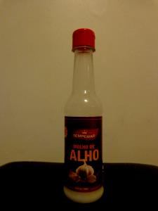 Quantas calorias em 1 colher de sopa (10 g) Molho de Alho?