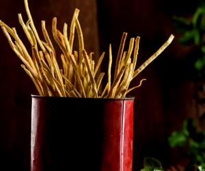 Quantas calorias em 1 Dose Gressinos De Parmesão E Ervas Aromáticas?