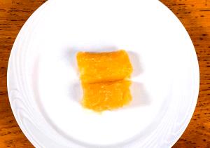 Quantas calorias em 1 Oz Aipim (Cozido)?