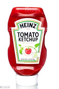 Quantas calorias em 1 Oz Catchup de Tomate?