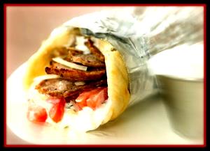 Quantas calorias em 1 Oz Gyro de Carne de Cordeiro?