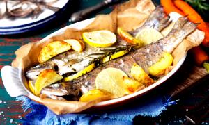 Quantas calorias em 1 Oz, Sem Espinhas (Produto Após Cozinhado) Hadoque no Forno ou Grelhado?