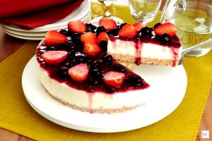 Quantas calorias em 1 Porção (142 G) Cheesecake com Frutas?