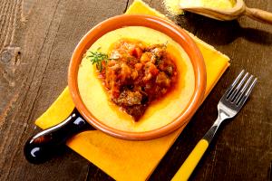 Quantas calorias em 1 Porção (160 G) Polenta no Forno ou Fervida?