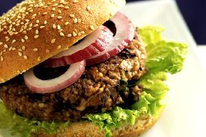 Quantas calorias em 1 porção (275 g) Burguer Vegano?