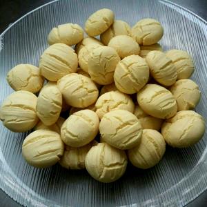 Quantas calorias em 1 porção (30 g) Sequilho de Leite Condensado?