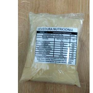 Quantas calorias em 1 porção (6 g) Levedura Nutricional?
