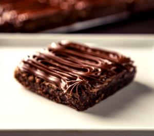 Quantas calorias em 1 porção (70 g) Brownie Creme de Avelã?