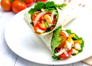 Quantas calorias em 1 porção Wrap Frango com Ervas (Grande)?