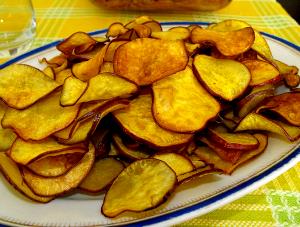 Quantas calorias em 1 Porção Batata doce sem casca frita com sal?