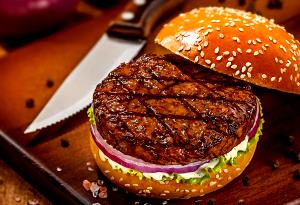 Quantas calorias em 1 Porção Hambúrguer bovino frito?