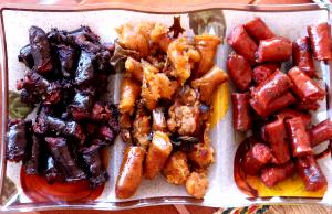 Quantas calorias em 1 Porção Morcilha cozido(a)?