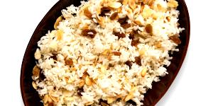 Quantas calorias em 1 Porçoes ARROZ COM PASSAS E AMENDOAS?