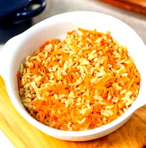 Quantas calorias em 1 Porçoes Arroz İntegral Com Cenoura?