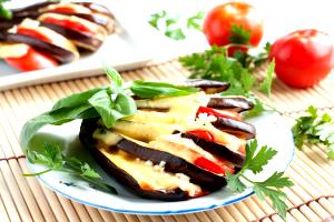 Quantas calorias em 1 Porçoes Berinjela Com Mussarela?