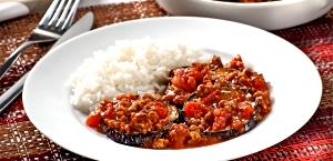 Quantas calorias em 1 Porçoes Berinjela À Bolonhesa?