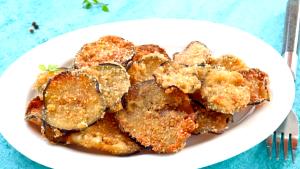 Quantas calorias em 1 Porçoes BERINJELA EMPANADA SEM GLÚTEN?