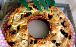 Quantas calorias em 1 Porçoes Bolo De Banana E Uva Passa?