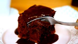 Quantas calorias em 1 Porçoes Bolo De Café E Chocolate?