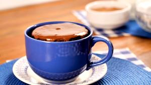 Quantas calorias em 1 Porçoes Bolo De Caneca De Microondas?