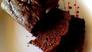 Quantas calorias em 1 Porçoes Bolo De Chocolate Com Coco E Banana?