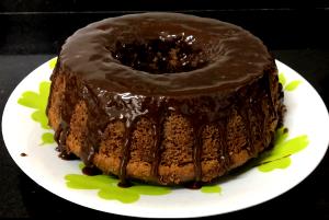 Quantas calorias em 1 Porçoes Bolo De Chocolate De Liquidificador?