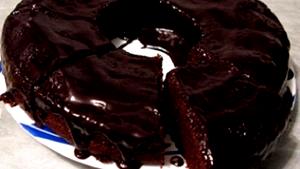 Quantas calorias em 1 Porçoes Bolo De Chocolate Microondas?