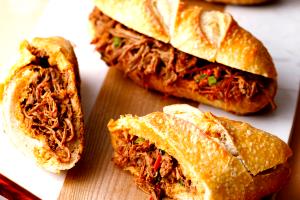 Quantas calorias em 1 Porçoes Carne Louca Desfiada?