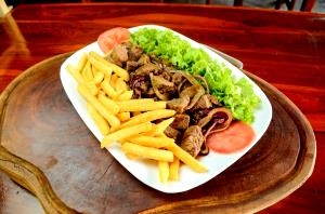 Quantas calorias em 1 Porçoes Carninha Com Batata?