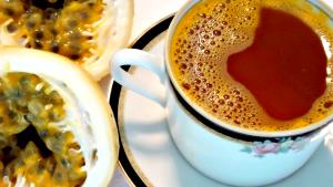 Quantas calorias em 1 Porçoes Chá De Gengibre Com Maracujá?