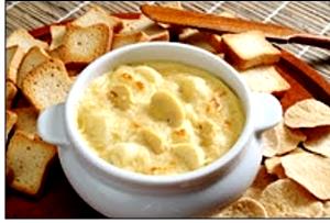 Quantas calorias em 1 Porçoes Creme De Palmito E Champignon?
