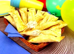 Quantas calorias em 1 Porçoes Enroladinho De Peito De Peru Com Ricota?