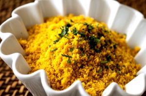 Quantas calorias em 1 Porçoes Farofa De Azeite?
