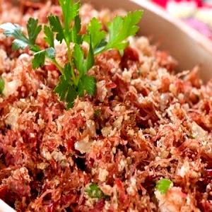 Quantas calorias em 1 Porçoes Farofa De Carne?
