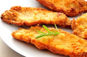 Quantas calorias em 1 Porçoes Filé De Peito De Frango À Milanesa Assado?