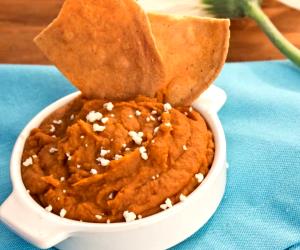 Quantas calorias em 1 Porçoes Frijoles Molidos?