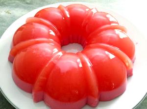 Quantas calorias em 1 Porçoes Gelatina Com Leite?