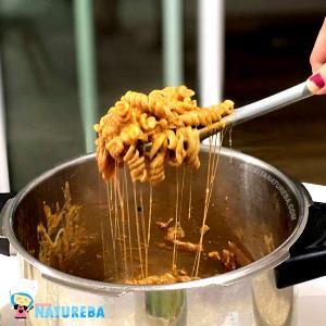 Quantas calorias em 1 Porçoes Macarrão Integral De Panela De Pressão?