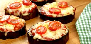 Quantas calorias em 1 Porçoes Mini Pizza De Beringela?