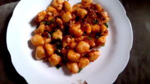 Quantas calorias em 1 Porçoes NHOQUE DE MANDIOCA?
