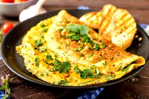 Quantas calorias em 1 Porçoes Omelete De Espinafre Com Queijo?