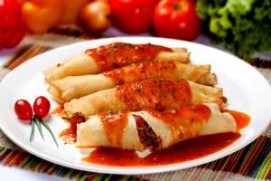 Quantas calorias em 1 Porçoes Panquecade Aveia Com Carne Moida?