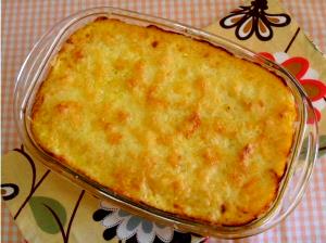 Quantas calorias em 1 Porçoes Peito De Frango Gratinado?