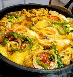 Quantas calorias em 1 Porçoes Peixe Escabeche No Forno?