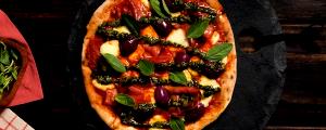 Quantas calorias em 1 Porçoes Pizza De Mortadela?