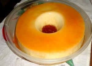Quantas calorias em 1 Porçoes Pudim De Leite Condensado Que Não Vai No Forno Light?
