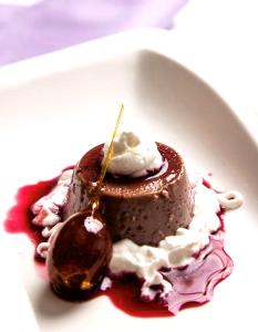 Quantas calorias em 1 Porçoes Pudim De Uva?