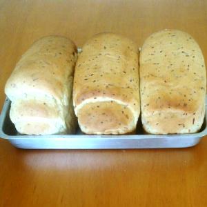 Quantas calorias em 1 Porçoes Pão Caseiro Temperado?