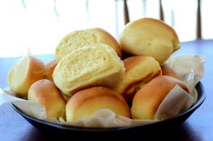 Quantas calorias em 1 Porçoes Pãozinho De Leite Ninho?